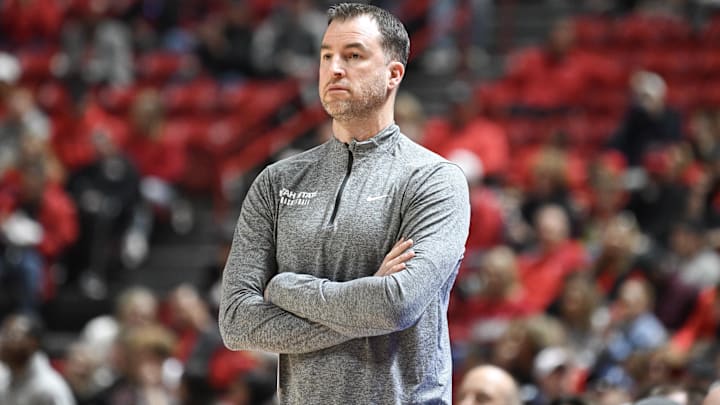 Jan 13, 2024; Las Vegas, Nevada, USA; Utah State Aggies head coach Danny Sprinkle looks on during the UNLV Rebels in the first half at Thomas & Mack Center. Mandatory Credit: Candice Ward-Imagn Images