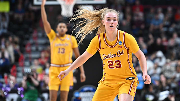 Mar 29, 2025; Spokane, WA, USA; USC Trojans guard Avery Howell (23) goes back on defense against the Kansas State Wildcats during the second half of a Sweet 16 NCAA Tournament basketball game against the Kansas State Wildcats at Spokane Arena. Mandatory Credit: James Snook-Imagn Images