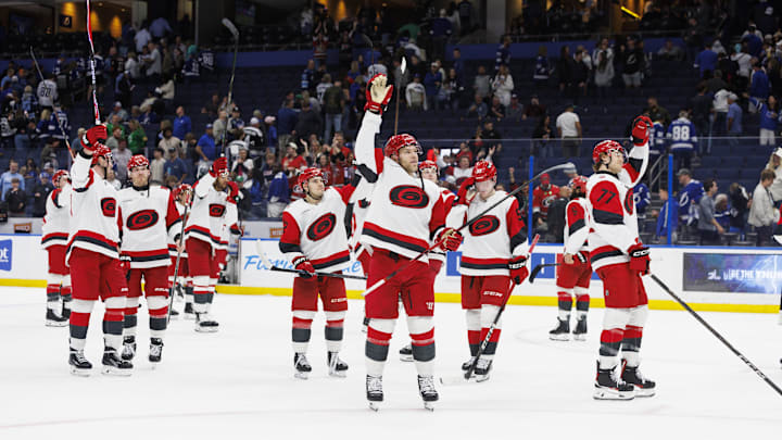 Mar 14, 2026; Tampa, Florida, USA; Carolina Hurricanes players wave to the crowd after the game against the Tampa Bay Lightning at Benchmark International Arena. Mandatory Credit: Morgan Tencza-Imagn Images