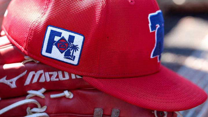 Feb 26, 2025; Dunedin, Florida, USA; Philadelphia Phillies outfielder Gabriel Rincones Jr. (85) hat sits in the dugout against the Toronto Blue Jays in the fifth inning during spring training at TD Ballpark. 