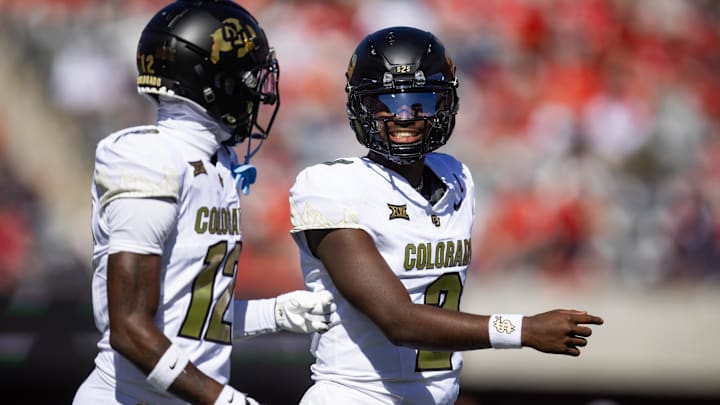 Colorado Buffalos quarterback Shedeur Sanders (2) with wide receiver Travis Hunter (12) against the Arizona Wildcats at Arizona Stadium. 