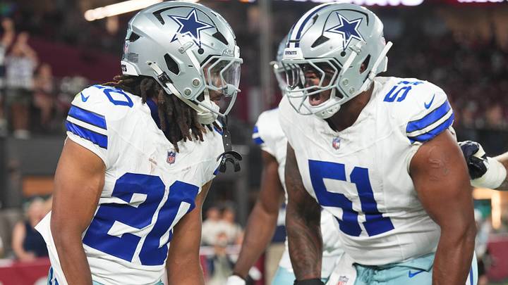 Dallas Cowboys running back Malik Davis celebrates his touchdown with guard Nick Leverett against the Arizona Cardinals. Dallas Cowboys running back Malik Davis celebrates his touchdown with guard Nick Leverett against the Arizona Cardinals.