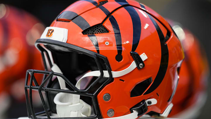 Oct 12, 2025; Green Bay, Wisconsin, USA;  General view of Cincinnati Bengals helmets on the sidelines prior to the game against the Green Bay Packers at Lambeau Field. Mandatory Credit: Jeff Hanisch-Imagn Images