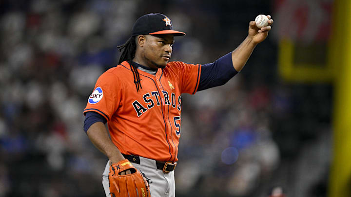 Sep 7, 2025; Arlington, Texas, USA; Houston Astros starting pitcher Framber Valdez (59) motions for a new ball during the sixth inning against the Texas Rangers at Globe Life Field. Mandatory Credit: Jerome Miron-Imagn Images