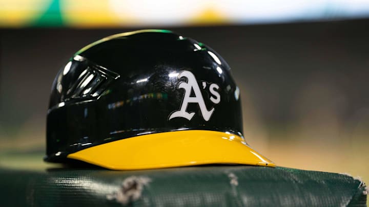 Jul 23, 2024; Oakland, California, USA; General view of an Oakland Athletics helmet after defeating the Houston Astros at Oakland-Alameda County Coliseum. Mandatory Credit: Stan Szeto-Imagn Images Jul 23, 2024; Oakland, California, USA; General view of an Oakland Athletics helmet after defeating the Houston Astros at Oakland-Alameda County Coliseum. Mandatory Credit: Stan Szeto-Imagn Images
