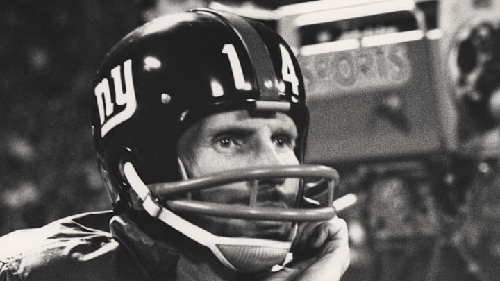 1962; Unknown Location; FILE PHOTO: New York Giants quarterback (14) Y.A. TITTLE waits to enter the game during the 1962 season. 1962; Unknown Location; FILE PHOTO: New York Giants quarterback (14) Y.A. TITTLE waits to enter the game during the 1962 season.