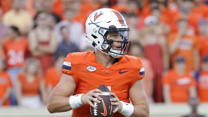 Aug 30, 2025; Charlottesville, Virginia, USA; Virginia Cavaliers quarterback Chandler Morris (4) prepares to throw the ball against the Coastal Carolina Chanticleers during the second quarter at Scott Stadium. Mandatory Credit: Amber Searls-Imagn Images Aug 30, 2025; Charlottesville, Virginia, USA; Virginia Cavaliers quarterback Chandler Morris (4) prepares to throw the ball against the Coastal Carolina Chanticleers during the second quarter at Scott Stadium. Mandatory Credit: Amber Searls-Imagn Images
