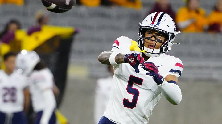 Arizona wide receiver Gio Richardson (5) catches a pass in warmups during a game against Arizona State at Mountain America Stadium in Tempe on Nov. 28, 2025. Arizona wide receiver Gio Richardson (5) catches a pass in warmups during a game against Arizona State at Mountain America Stadium in Tempe on Nov. 28, 2025.