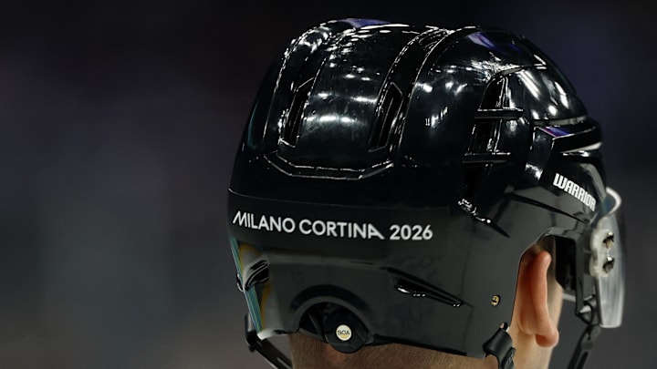 Feb 11, 2026; Milan, Italy; The back of the helmet of the match officials during the match in men's ice hockey group B play between Finland and Slovakia during the Milano Cortina 2026 Olympic Winter Games at Milano Santagiulia Ice Hockey Arena. Mandatory Credit: Geoff Burke-Imagn Images