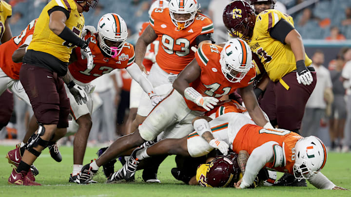 Daylen Russell, Chase Smith, Juan Rodriguez, Bethune-Cookman v Miami Daylen Russell, Chase Smith, Juan Rodriguez, Bethune-Cookman v Miami
