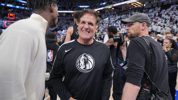 May 24, 2024; Minneapolis, Minnesota, USA; Dallas Mavericks owner Mark Cuban celebrates after defeating the Minnesota Timberwolves in game two of the western conference finals for the 2024 NBA playoffs at Target Center. Mandatory Credit: Brad Rempel-USA TODAY Sports