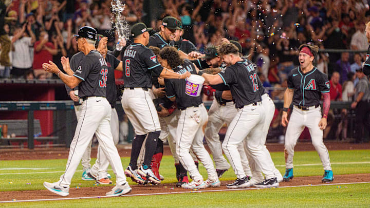 Jun 14, 2025; Phoenix, Arizona, USA; A general view as the Arizona Diamondbacks team celebrates a ninth inning come back to beat the San Diego Padres 8-7 at Chase Field. Mandatory Credit: Allan Henry-Imagn Images Jun 14, 2025; Phoenix, Arizona, USA; A general view as the Arizona Diamondbacks team celebrates a ninth inning come back to beat the San Diego Padres 8-7 at Chase Field. Mandatory Credit: Allan Henry-Imagn Images