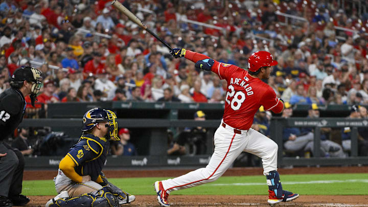Sep 19, 2025; St. Louis, Missouri, USA; St. Louis Cardinals third baseman Nolan Arenado (28) hits a three run double against the Milwaukee Brewers during the fifth inning at Busch Stadium. Mandatory Credit: Jeff Curry-Imagn Images Sep 19, 2025; St. Louis, Missouri, USA; St. Louis Cardinals third baseman Nolan Arenado (28) hits a three run double against the Milwaukee Brewers during the fifth inning at Busch Stadium. Mandatory Credit: Jeff Curry-Imagn Images