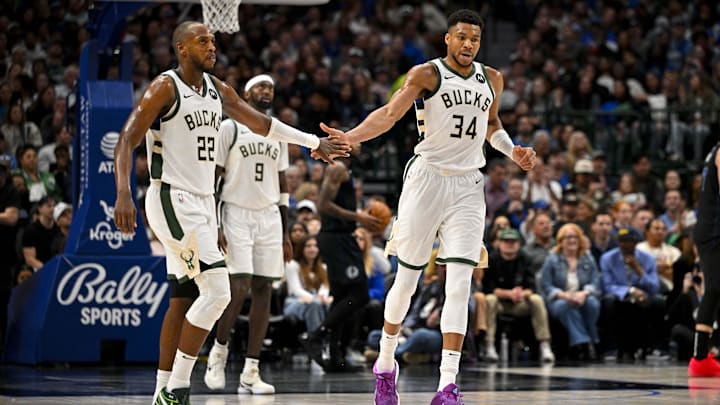 Feb 3, 2024; Dallas, Texas, USA; Milwaukee Bucks forward Khris Middleton (22) and forward Giannis Antetokounmpo (34) celebrate during the second quarter against the Dallas Mavericks at the American Airlines Center. Mandatory Credit: Jerome Miron-Imagn Images Feb 3, 2024; Dallas, Texas, USA; Milwaukee Bucks forward Khris Middleton (22) and forward Giannis Antetokounmpo (34) celebrate during the second quarter against the Dallas Mavericks at the American Airlines Center. Mandatory Credit: Jerome Miron-Imagn Images