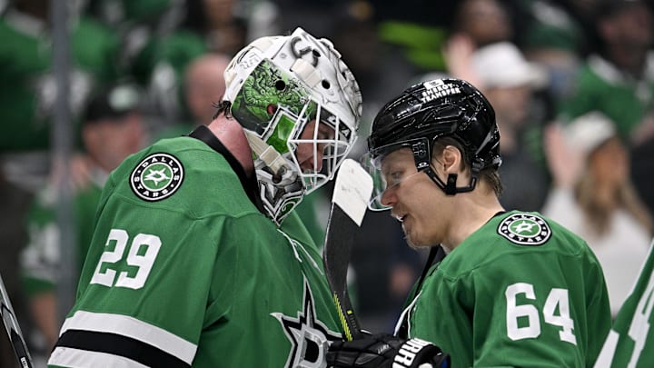 Apr 28, 2025; Dallas, Texas, USA; Dallas Stars goaltender Jake Oettinger (29) and center Mikael Granlund (64) celebrate the win over the Colorado Avalanche in game five of the first round of the 2025 Stanley Cup Playoffs at American Airlines Center. Mandatory Credit: Jerome Miron-Imagn Images