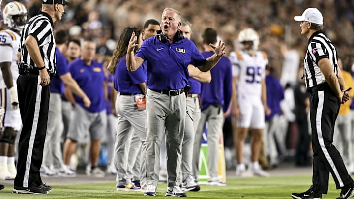 Oct 26, 2024; College Station, Texas, USA; LSU Tigers head coach Brian Kelly speaks with the officials during a time out in the second quarter against the LSU Tigers at Kyle Field. Mandatory Credit: Maria Lysaker-Imagn Images. 