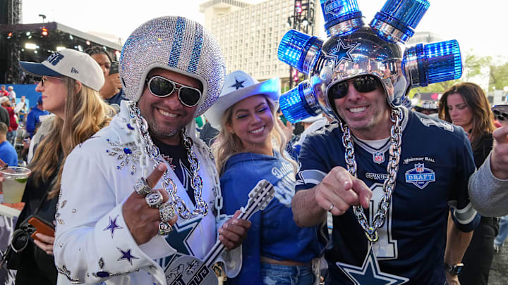 Dallas Cowboys fans pose for a photo before the first round of the NFL Draft at Union Station. 