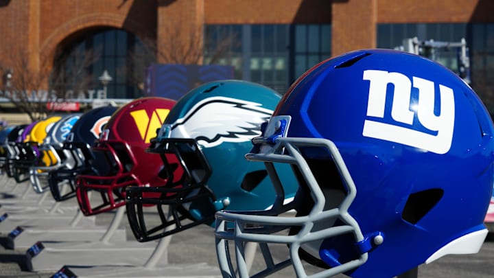 Feb 28, 2024; Indianapolis, IN, USA; A general view of large New York Giants and Philadelphia Eagles helmets at the NFL Scouting Combine Experience at Lucas Oil Stadium. Mandatory Credit: Kirby Lee-Imagn Images