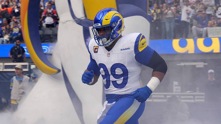 Dec 3, 2023; Inglewood, California, USA; Los Angeles Rams defensive tackle Aaron Donald (99) enters the field before the game against the Cleveland Browns at SoFi Stadium. Mandatory Credit: Kirby Lee-USA TODAY Sports Dec 3, 2023; Inglewood, California, USA; Los Angeles Rams defensive tackle Aaron Donald (99) enters the field before the game against the Cleveland Browns at SoFi Stadium. Mandatory Credit: Kirby Lee-USA TODAY Sports