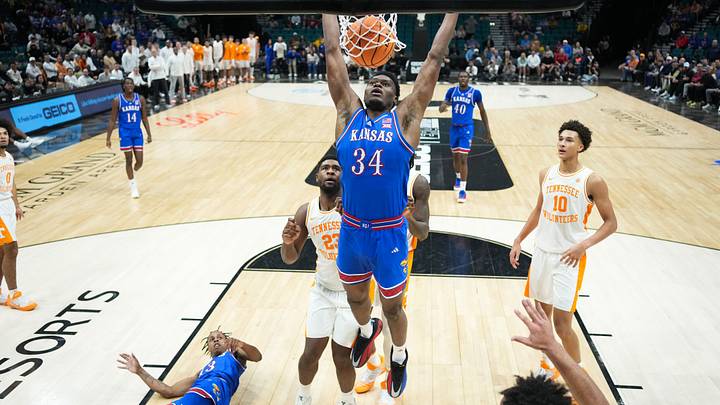 Nov 26, 2025; Las Vegas, NV, USA; Kansas Jayhawks center Paul Mbiya (34) guards the rebound in the second half against the Tennessee Volunteers in the 2025 Players Era Festival third place game at MGM Grand Garden Arena. Mandatory Credit: Kirby Lee-Imagn Images Nov 26, 2025; Las Vegas, NV, USA; Kansas Jayhawks center Paul Mbiya (34) guards the rebound in the second half against the Tennessee Volunteers in the 2025 Players Era Festival third place game at MGM Grand Garden Arena. Mandatory Credit: Kirby Lee-Imagn Images