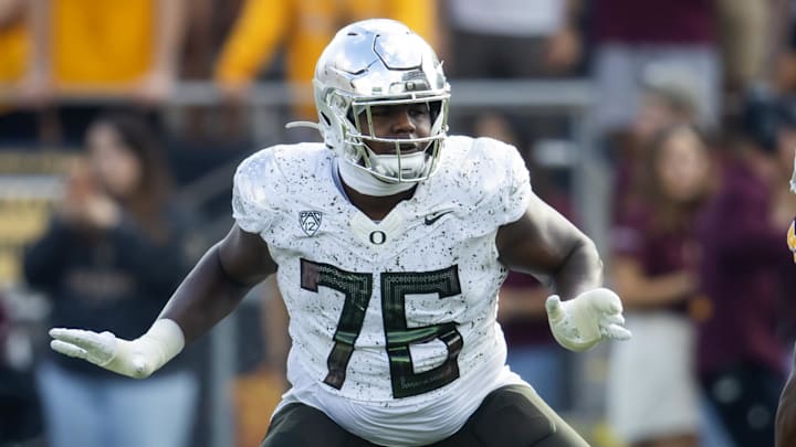 Nov 18, 2023; Tempe, Arizona, USA; Oregon Ducks offensive lineman Josh Conerly Jr. (76) against the Arizona State Sun Devils at Mountain America Stadium. Mandatory Credit: Mark J. Rebilas-Imagn Images