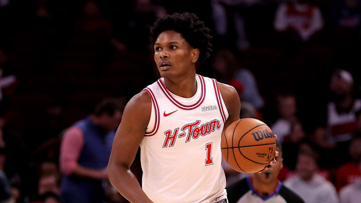 Nov 12, 2025; Houston, Texas, USA; Houston Rockets guard Amen Thompson (1) handles the ball against the Washington Wizards during the game at Toyota Center. Mandatory Credit: Erik Williams-Imagn Images