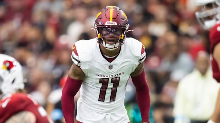 Sep 29, 2024; Glendale, Arizona, USA; Washington Commanders safety Jeremy Chinn (11) against the Arizona Cardinals at State Farm Stadium. Mandatory Credit: Mark J. Rebilas-Imagn Images