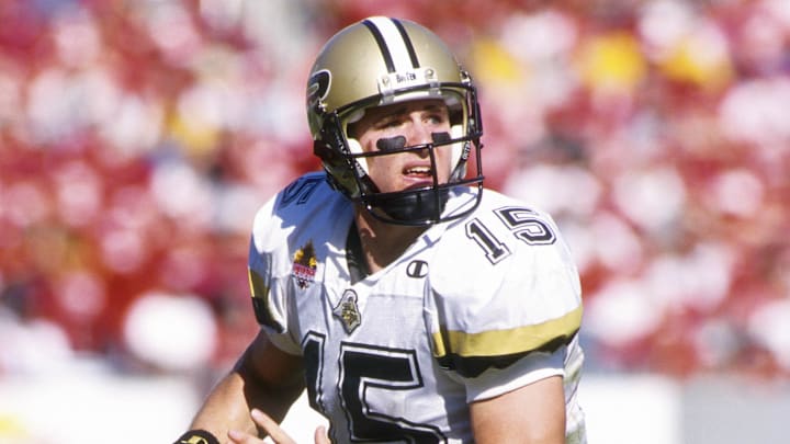 Purdue Boilermakers quarterback Drew Brees (15) in action Purdue Boilermakers quarterback Drew Brees (15) in action