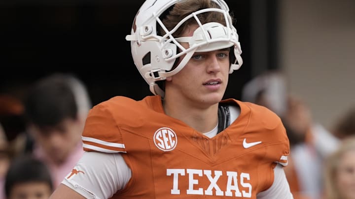 Texas Longhorns quarterback Arch Manning (16) pauses while warming up before a game against the Vanderbilt Commodores at Darrell K Royal-Texas Memorial Stadium. Texas Longhorns quarterback Arch Manning (16) pauses while warming up before a game against the Vanderbilt Commodores at Darrell K Royal-Texas Memorial Stadium.