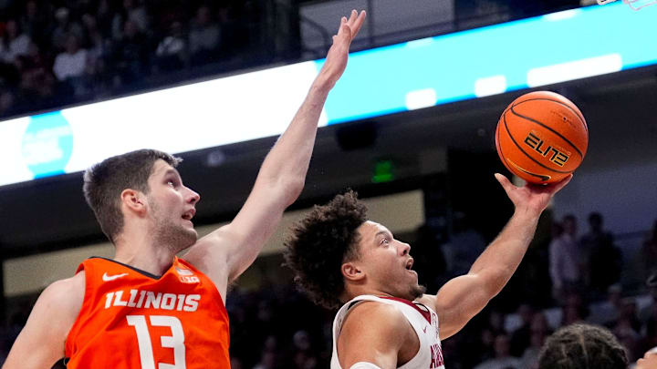 Nov 20, 2024; Birmingham, AL, USA; Illinois center Tomislav Ivisic (13) defends as Alabama guard Mark Sears (1) goes to the basket in the CM Newton Classic at Legacy Arena. Alabama defeated Illinois 100-87. Mandatory Credit: Gary Cosby Jr.-Tuscaloosa News Nov 20, 2024; Birmingham, AL, USA; Illinois center Tomislav Ivisic (13) defends as Alabama guard Mark Sears (1) goes to the basket in the CM Newton Classic at Legacy Arena. Alabama defeated Illinois 100-87. Mandatory Credit: Gary Cosby Jr.-Tuscaloosa News