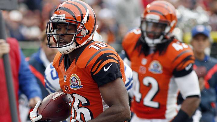 Dec 9, 2012; Cincinnati, USA; Cincinnati Bengals wide receiver Andrew Hawkins (16) scores a touchdown during the first half against the Dallas Cowboys at Paul Brown Stadium. Mandatory Credit: David Kohl-Imagn Images