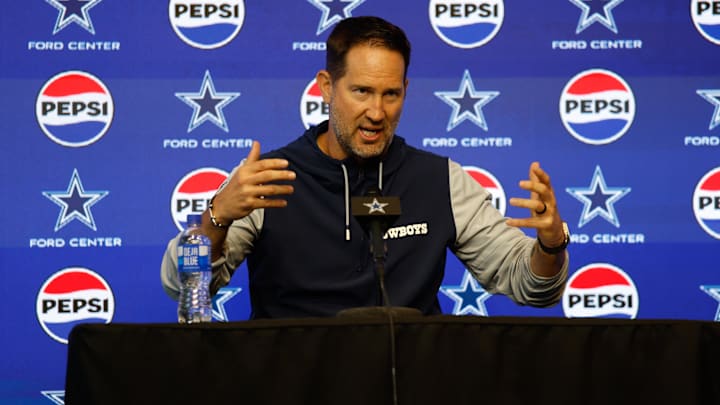 Dallas Cowboys head coach Brian Schottenheimer addresses the media before practice at the Ford Center. Dallas Cowboys head coach Brian Schottenheimer addresses the media before practice at the Ford Center.