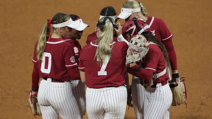 May 7, 2025; Athens, GA, USA; Alabama teammates meet on the mound during a game against South Carolina at Jack Turner Stadium. Mandatory Credit: Mady Mertens-Imagn Images