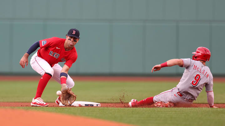 Jul 2, 2025; Boston, Massachusetts, USA; Cincinnati Reds shortstop Matt McLain (9) steals second past Boston Red Sox third baseman Marcelo Mayer (39) during the first inning against the Boston Red Sox at Fenway Park. Mandatory Credit: Paul Rutherford-Imagn Images
