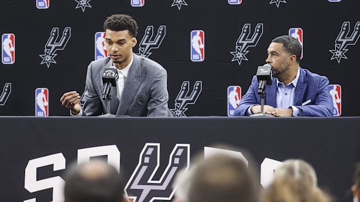 Jun 24, 2023; San Antonio, TX, USA; San Antonio Spurs draft pick Victor Wembanyama (left) speaks along with general manager Brian Wright at a press conference at Frost Bank Center.