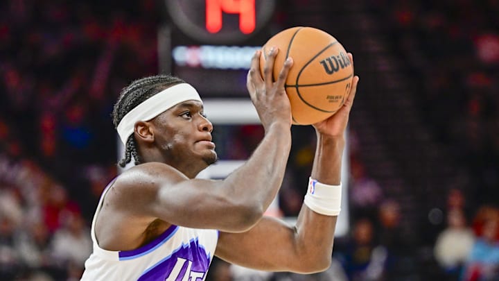 Oct 16, 2025; Salt Lake City, Utah, USA; Utah Jazz forward Taylor Hendricks (0) lines up his shot during the second half against the Portland Trail Blazers at Delta Center. Mandatory Credit: Peter Creveling-Imagn Images