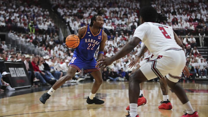Feb 2, 2026; Lubbock, Texas, USA; Kansas Jayhawks guard Darryn Peterson (22) dribbles the ball against Texas Tech Red Raiders guard Jazz Henderson (2) in the second half at United Supermarkets Arena. Mandatory Credit: Michael C. Johnson-Imagn Images Feb 2, 2026; Lubbock, Texas, USA; Kansas Jayhawks guard Darryn Peterson (22) dribbles the ball against Texas Tech Red Raiders guard Jazz Henderson (2) in the second half at United Supermarkets Arena. Mandatory Credit: Michael C. Johnson-Imagn Images
