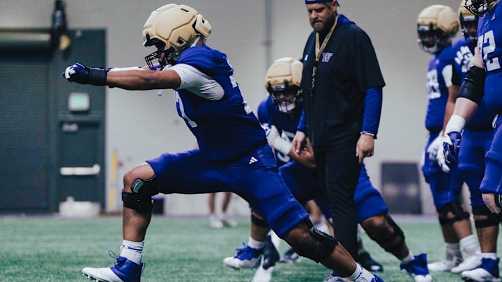 Max McCree takes a big step during this spring drill. Max McCree takes a big step during this spring drill.