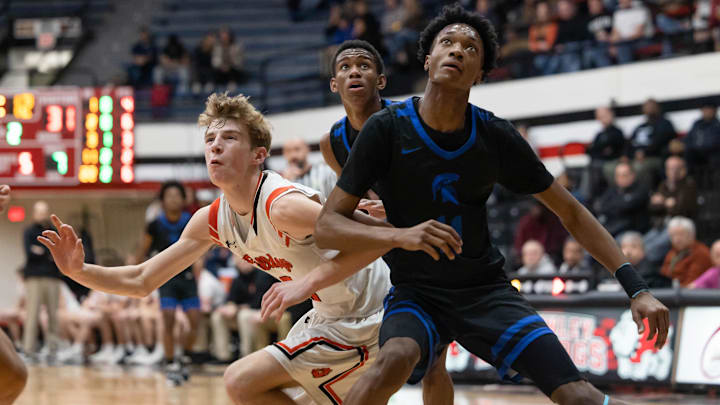 Dalton sophomore Brady Hignight and Richmond Heights sophomore Dorian Jones battle for position for a rebound during the Division IV Regional Final game at the Canton Memorial Fieldhouse, March 10, 2023.

Dalton Bulldogs Vs Richmond Heights Spartans Division Iv Regional Final High School Basketball