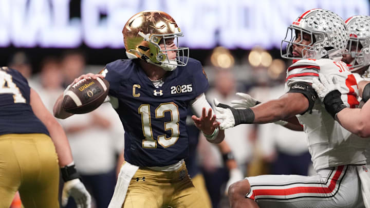 Jan 20, 2025; Atlanta, GA, USA; Notre Dame Fighting Irish quarterback Riley Leonard (13) throws a pass against the Ohio State Buckeyes in the second half in the CFP National Championship college football game at Mercedes-Benz Stadium. Jan 20, 2025; Atlanta, GA, USA; Notre Dame Fighting Irish quarterback Riley Leonard (13) throws a pass against the Ohio State Buckeyes in the second half in the CFP National Championship college football game at Mercedes-Benz Stadium.