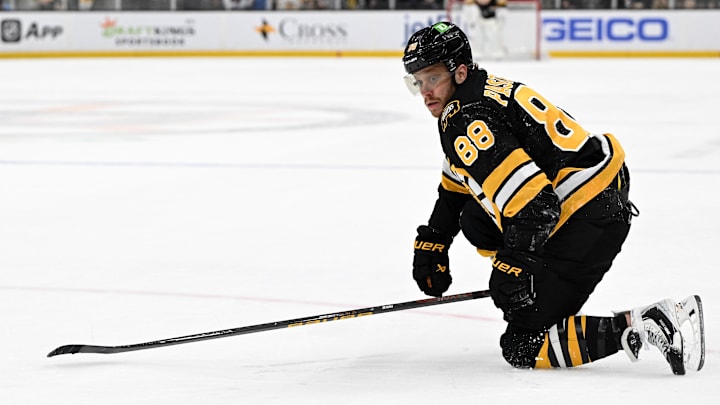 Mar 31, 2026; Boston, Massachusetts, USA; Boston Bruins right wing David Pastrnak (88) falls on the ice during the first period of a game against the Dallas Stars at the TD Garden. Mandatory Credit: Brian Fluharty-Imagn Images