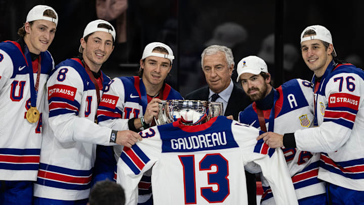 Switzerland v USA - 2025 IIHF Ice Hockey World Championship Final, Clayton Keller, Zach Werenski, Conor Garland, Tage Thompson, Brady Skjei all with the World Championship trophy, while holding  the late Johnny Gaudreau's team USA jersey