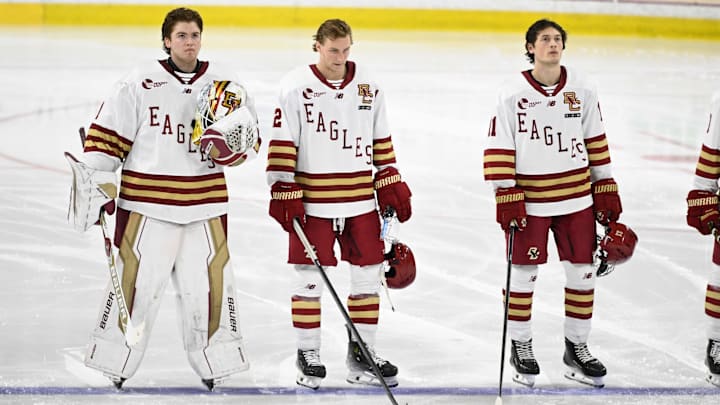 Feb 28, 2025; Chestnut Hill, MA, USA; Boston College goaltender Jacob Fowler (1), forward Mike Posma (12), and defenseman Michael Hagens (11) stand on the blue line for the national anthem before a game against the University of New Hampshire Wildcats at Conte Forum. Mandatory Credit: Eric Canha-Imagn Images