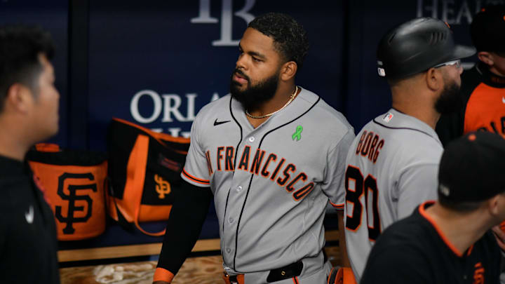 May 1, 2026; St. Petersburg, Florida, USA; San Francisco Giants outfielder Heliot Ramos (17) walks into the dugout during the seventh inning against Tampa Bay Rays at Tropicana Field. Mandatory Credit: Pablo Robles-Imagn Images