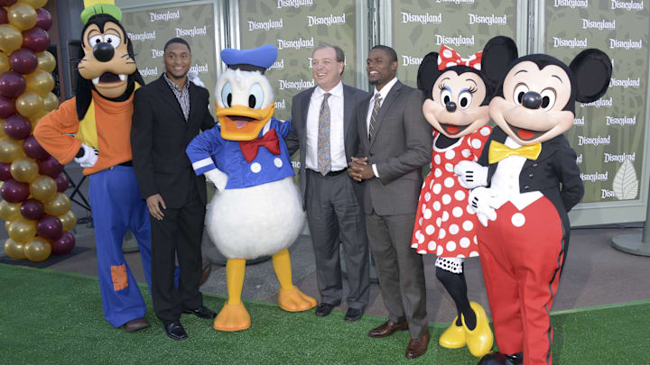 Dec 31, 2013; Anaheim, CA, USA; Florida State Seminoles players and coaches pose with Disney characters at a press conference for the 2014 BCS National Championship at ESPN Zone Downtown Disney. From left: Goofy and receiver Rashad Greene and Donald Duck and Jimbo Fisher and defensive back Lamarcus Joyner and Minnie Mouse and Mickey Mouse. Dec 31, 2013; Anaheim, CA, USA; Florida State Seminoles players and coaches pose with Disney characters at a press conference for the 2014 BCS National Championship at ESPN Zone Downtown Disney. From left: Goofy and receiver Rashad Greene and Donald Duck and Jimbo Fisher and defensive back Lamarcus Joyner and Minnie Mouse and Mickey Mouse.