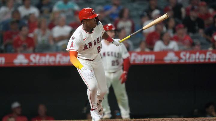 Sep 14, 2026; Anaheim, California, USA; Los Angeles Angels third baseman Denzer Guzman (23) hits a two RBI single in the fifth inning against the Seattle Mariners at Angel Stadium. Mandatory Credit: Kirby Lee-Imagn Images Sep 14, 2026; Anaheim, California, USA; Los Angeles Angels third baseman Denzer Guzman (23) hits a two RBI single in the fifth inning against the Seattle Mariners at Angel Stadium. Mandatory Credit: Kirby Lee-Imagn Images