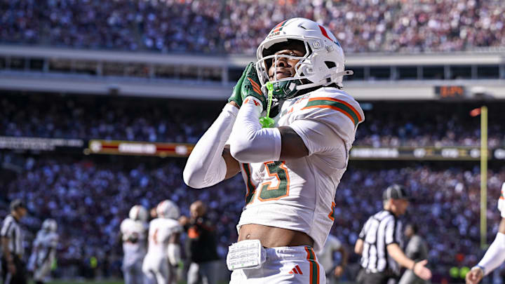 Dec 20, 2025; College Station, TX, USA; Miami Hurricanes defensive back Bryce Fitzgerald (13) celebrates after he intercepts a Texas A&M Aggies pass in the end zone during the game between the Aggies and the Hurricanes at Kyle Field. Mandatory Credit: Jerome Miron-Imagn Images Dec 20, 2025; College Station, TX, USA; Miami Hurricanes defensive back Bryce Fitzgerald (13) celebrates after he intercepts a Texas A&M Aggies pass in the end zone during the game between the Aggies and the Hurricanes at Kyle Field. Mandatory Credit: Jerome Miron-Imagn Images