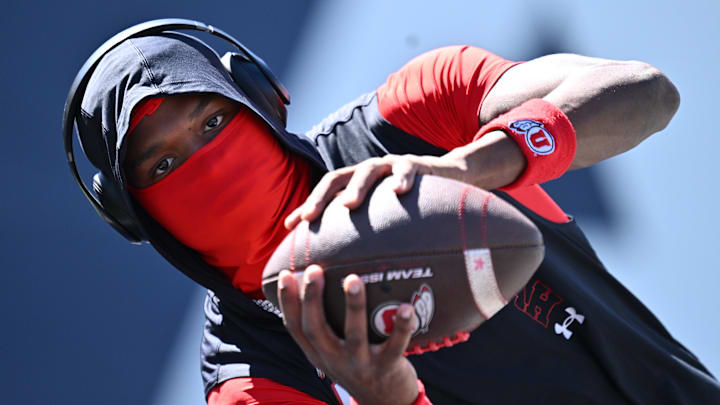 Sep 14, 2024; Logan, Utah, USA; Utah Utes cornerback Cameron Calhoun (4) warms up before a game against the Utah State Aggies at Merlin Olsen Field at Maverik Stadium. Mandatory Credit: Jamie Sabau-Imagn Images Sep 14, 2024; Logan, Utah, USA; Utah Utes cornerback Cameron Calhoun (4) warms up before a game against the Utah State Aggies at Merlin Olsen Field at Maverik Stadium. Mandatory Credit: Jamie Sabau-Imagn Images