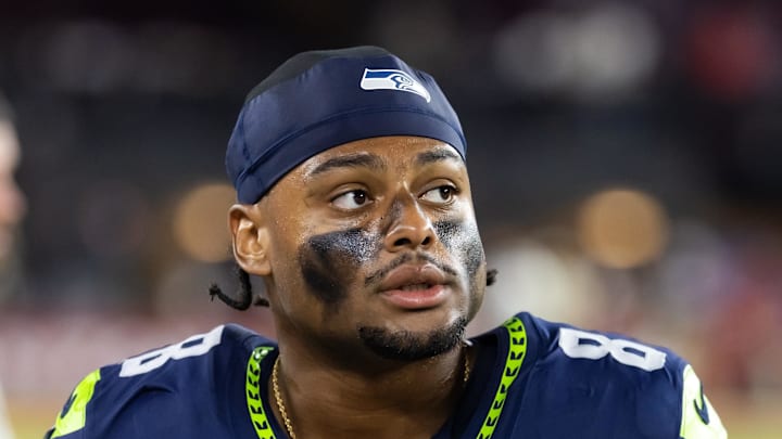 Seattle Seahawks safety Coby Bryant looks at the scoreboard