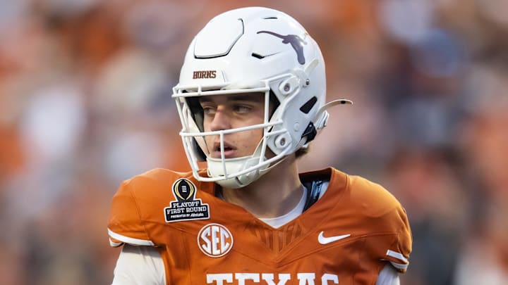 Dec 21, 2024; Austin, Texas, USA; Texas Longhorns quarterback Arch Manning (16) against the Clemson Tigers during the CFP National playoff first round at Darrell K Royal-Texas Memorial Stadium. Mandatory Credit: Mark J. Rebilas-Imagn Images